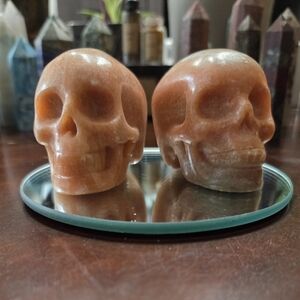 2 Orange Calcite Skulls